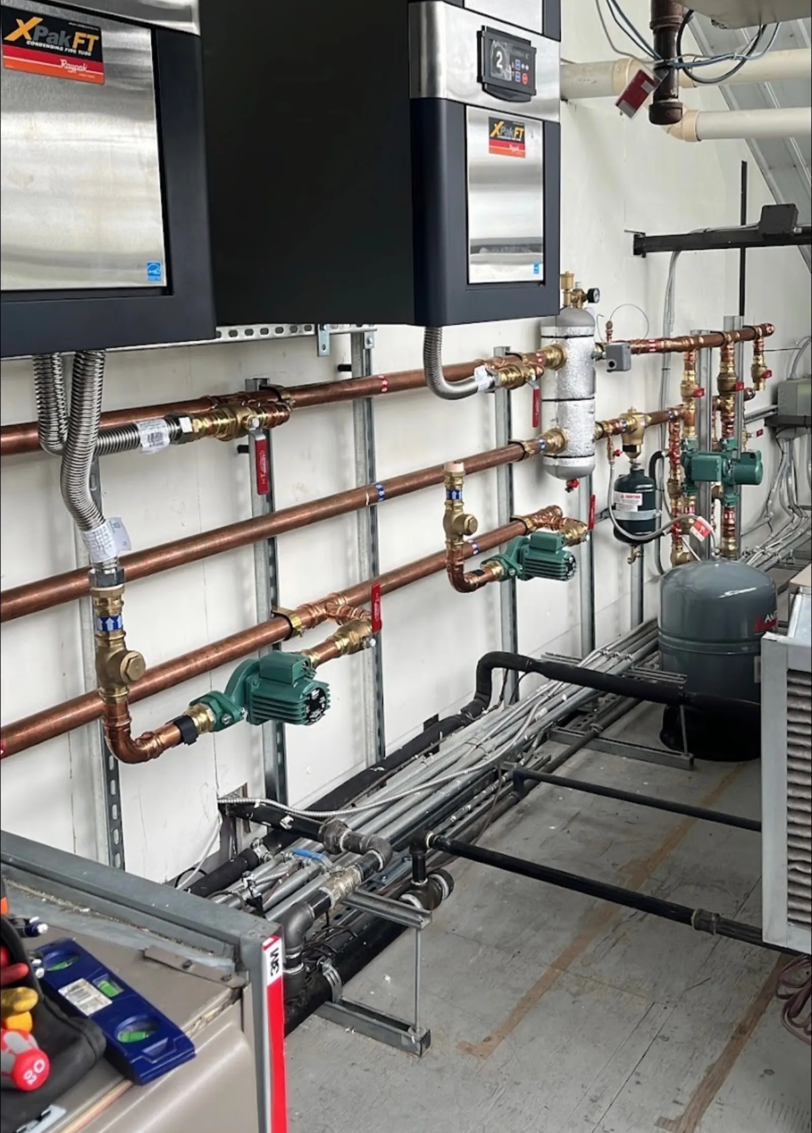 Commercial boiler installation with copper piping by Comfort Tech